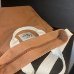 Lily green tan tote bag with zipper and a side pocket for a bottle or cup Photo 5