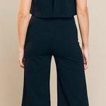 Blue Blush Vestique Black Ruffle Romper Photo 1