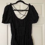 Princess Polly NWT  Black Short Sleeve Shirred Open Back Romper Photo 4