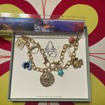 Gold tone and Blue Charm Bracelet with Delicate Charms for your handbag Photo 2