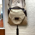 Classic Fashion Outback bag. Tan with pebbled leather handles and trim. Photo 2