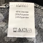 Princess Polly Adora Mini Skirt in Black with White Flowers Photo 7