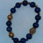 10mm Blue Tiger eye and Gold Beaded Bracelet with Textured Accents Photo 1