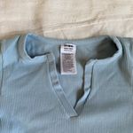 Cotton On light blue long sleeve top NWOT Photo 1