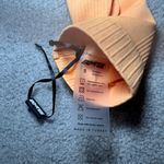 Bo and Tee NWOT  Orange Leggings Size Small Photo 3