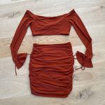 Majorelle  - Destiny Off Shoulder Crop Top & Ruched Mini Skirt in Orange Rust Photo 3