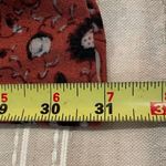 Free People  Some Like It Hot Long Sleeve V-Neck Jumpsuit in Rust Combo Photo 10