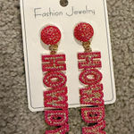 Pink and gold glitter "Howdy" earrings #festivalvibes Photo 0