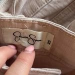 Jessica Simpson Low waisted  light pink distressed jeans Photo 3