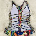 Abstract Plunging Strappy Cheeky Colorful Cutout Bathing Suit Photo 5