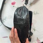 Guess Black Quilted floral Crossbody Bag with cheetah lining and bag charm Photo 5