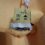 Daisy Mango Colored Leggings Size Medium NWT Photo 3