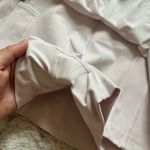 Aritzia  TnAction light lavender tennis mini pleated skort size S Photo 2