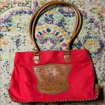 Disney  Red Cotton Tote with Embossed Pooh & Tigger scene Photo 0