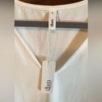 Glam NWT  V Neck Bodysuit with puff sleeves Photo 1