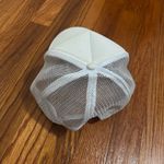 A white trucker hat with astrology symbols on it! One size Photo 3