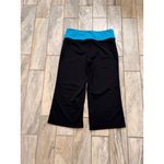 Nike women's small (4/6) black/blue Performance capri wide leg capri leggings Photo 1