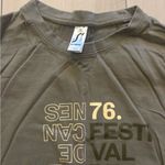 Cannes Film Festival (Festival de Cannes) green and cream t shirt Photo 1