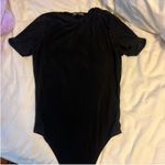 Pretty Little Thing Black bodysuit  with double lined in the front with stretch material Photo 0