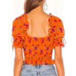 For Love & Lemons Peony Smocked Crop Top in Tangerine Orange Photo 2