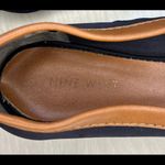 Nine West  Black slip-on shoes with a leather brown trim with a belt. Photo 7