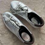 Michael Kors Silver Womens Sneakers W/ Monogram Heel & Logo Accents Size 8.5 Photo 0
