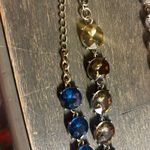 Pair of Blue and Brown Gemstone Bracelets Photo 4