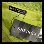 SheIn oversized Lime green satin /sequence buttondown blouse - Size Large-NWT with bag******Refer to measurements. Beautiful green button down blouse with sequins. Can be warn as dress as shown. Never warn & excellent condition. Measurements approximately 25” from armpit to armpit x 25” -29” long. Non-smoking home. priced to sell at as is condition. Don’t like my price, make reasonable offer! And thank you for checking my closet. Photo 5
