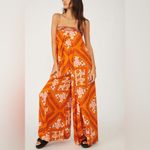 Free People Serendipity Jumpsuit in Rust Combo Photo 1
