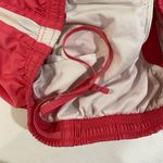 Nike FitDry Tempo Running Shorts Women’s Medium Red Yellow Trim Activewear Photo 7