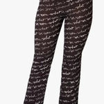 We Wore What NWT‎  Woman's Sz XS Black Sheer Flared Leg Logo Print Smocked Pants Photo 0