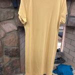 2X Absolutely ❤️It simply simple long dress. Nice color no flaws easy fit Gold Photo 2