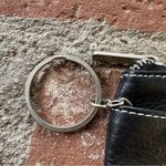 DESIGNERS GUILD coin purse Black caviar leather with zipper and ring Photo 1