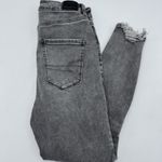 American Eagle  Next Level Stretch grey black distressed skinny jeans raw hem Photo 1