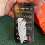 Gigo Active Brazil halter sports bra in orange white and yellow size S small NWT Photo 12