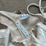 Selfie Leslie Angel Eyes Cowl Neck Asymmetrical Hem Mini Dress in Champagne Photo 6