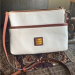 Dooney & Bourke Authentic  White Pebbled Leather Logo zip top crossbody Photo 0