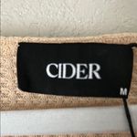 Cider  Size M HOLLOW OUT RUFFLE HEM SHORT SLEEVE SHEER CROCHET TOP in Burlywood Photo 4