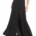 Women size small long black dress with small train bust and waist mesh detail Photo 3