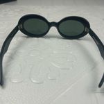 House of Hugo Womenโs Oval Sunglasses Black Frame Green Lenses Retro Style Photo 2