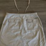 Cute tan mini skirt with adjustable waist Size 6 Photo 1
