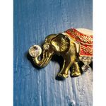 Vintage elephant pin brooch gold tone red white enamel rhinestones trunk up Photo 1