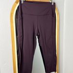 Zyia dark purple knee cropped athletic leggings with pockets Photo 0