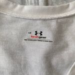 Under Armour women L heat gear loose fit v-cut short sleeve top white Photo 5