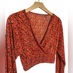 Urban Outfitters Floral Plisse Wrap Top Photo 3