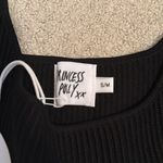 Princess Polly Gorgeous ribbed black mini dress from ! Dress it up or down! Photo 2