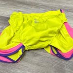 Nike  Women's Vibrant Yellow and Pink Athletic Shorts are a size small. Photo 7
