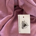 NWT! Women’s Parks Disney Land pink holographic long sleeve sweatshirt L Photo 4