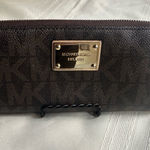 Michael Kors  Chocolate Brown Wallet with Gold Plate Photo 0