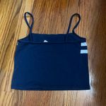 Brandy Melville Navy blue tank with 2 white stripes size small. Photo 1